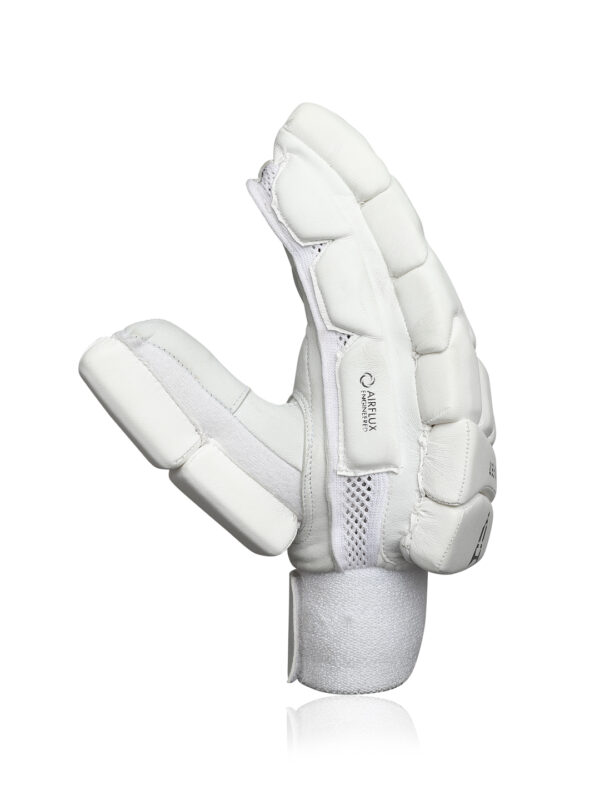 Close-up of professional cricket batting gloves showing detailed stitching and durable material.