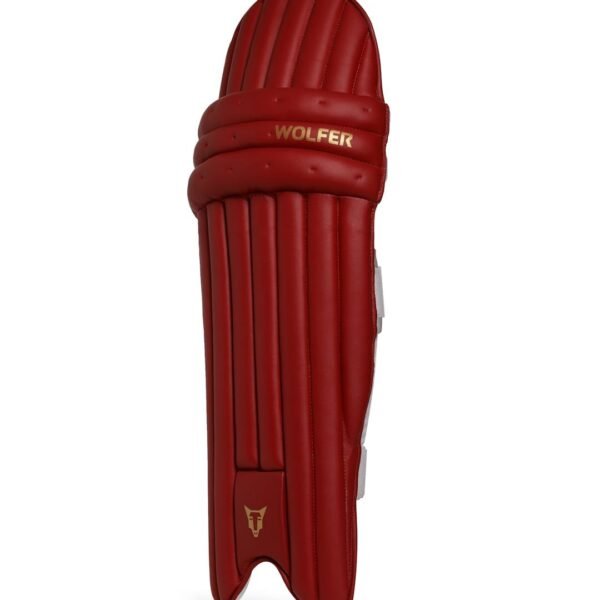 Wolfer red cricket batting pad with vertical padding and reinforced knee protection.