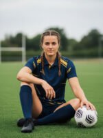 Outdoor Shoot of Wolfer Custom Made cricket t-shirt in Deep Blue featuring moisture-wicking fabric and unlimited custom design options.