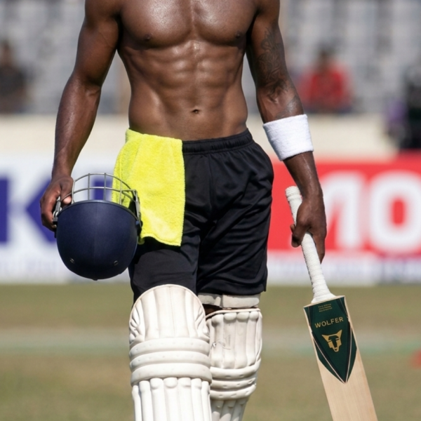 Wolfer Bison Thick Edge full profile english willow cricket bat, model training photoshoot