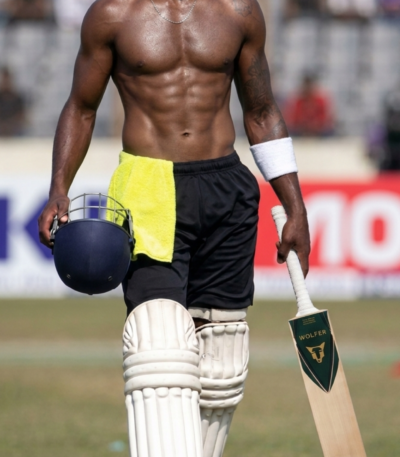 Wolfer Bison Thick Edge full profile english willow cricket bat, model training photoshoot